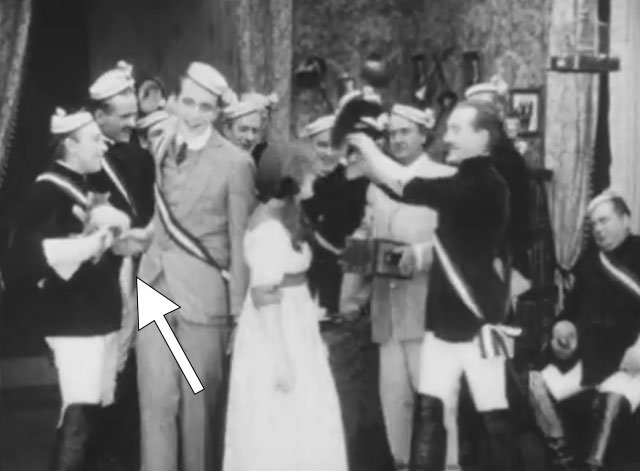 Ole Heidelberg - man holding tabby kitten with Karl Wallace Reid, Katie Dorothy Gish and other male students