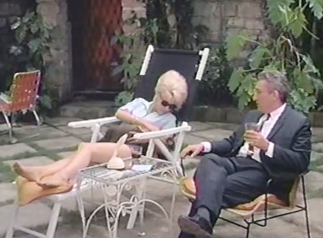The Omegans - seal point Siamese cat in lap of Linda Ingrid Pitt on lawn chair with Valdemar Lucien Pan