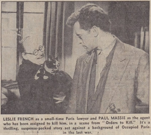 Orders to Kill - newspaper clipping of tortoiseshell and white cat Minou held by Lafitte Leslie French with Summers Paul Massie