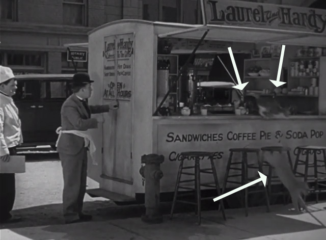 Pack Up Your Troubles - numerous cats leaping out of lunch wagon owned by Laurel and Hardy