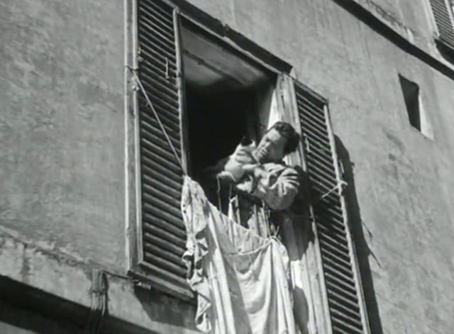 Papa diventa mamma - Guiseppe Aldo Fabrizi holding small tuxedo cat in window