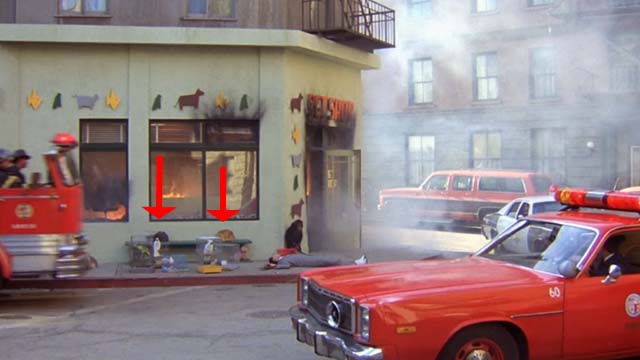 Pee Wee's Big Adventure - cats on bench outside burning pet shop