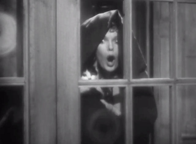 Peg of Old Drury - Peg Anna Neagle looking shocked through window with black and white cat
