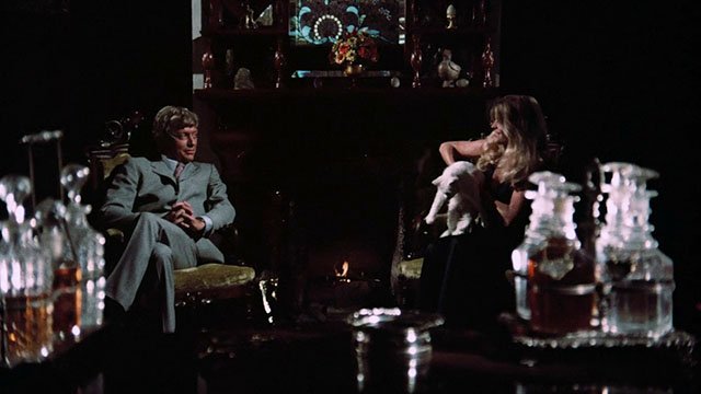 Pets - Bonnie Candice Rialson picking up white Angora cat Lila sitting across from Stackman Ed Bishop
