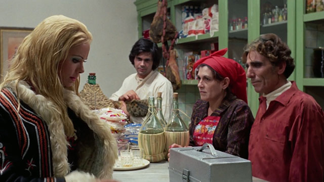 The Police Are Blundering in the Dark - La polizia brancola nel buio - man holding calico tabby cat at bar with parents and Enrichetta Blond Margaret Rose Keil