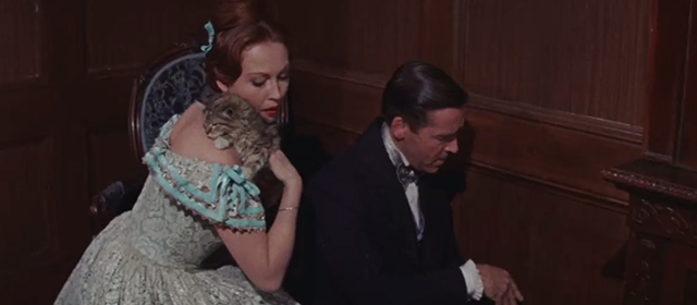 Premature Burial - Emily Hazel Court holding long-haired tabby kitten on shoulder with Miles Richard Ney