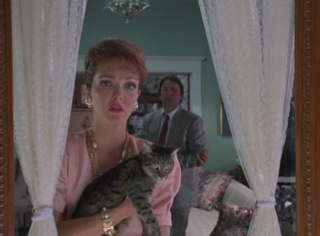 Problem Child - Flo Amy Yasbeck holding tabby cat Fuzzball with Ben John Ritter