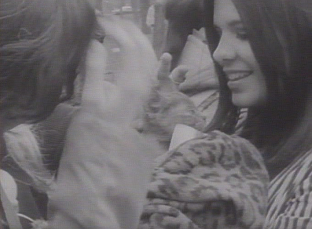 Protests Galore newsreel - two girls with cat at love-in in Detroit