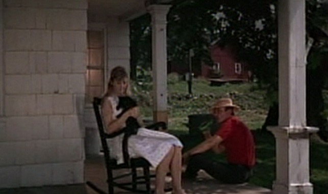 Rachel, Rachel - Rachel holding black cat on lap on porch