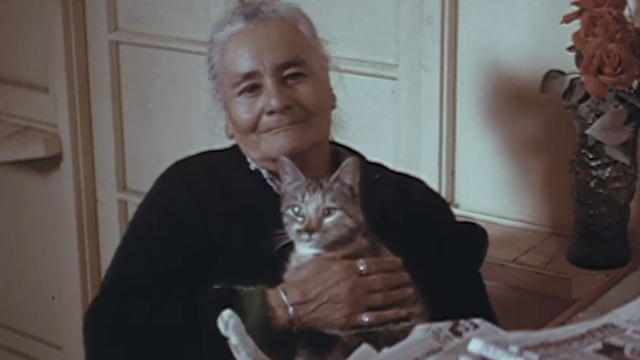 Rafferty and the Gold Dust Twins - woman holding torbie cat