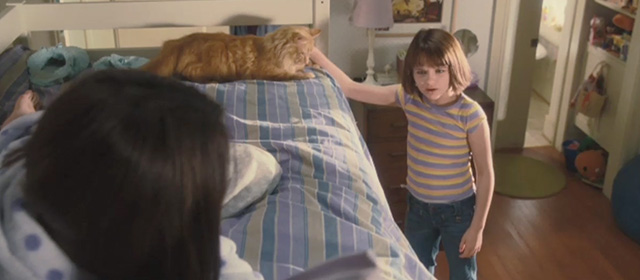 Ramona and Beezus - long-haired orange tabby cat Picky Picky Miller lying on bed with Beezus and being petted by Ramona Joey King