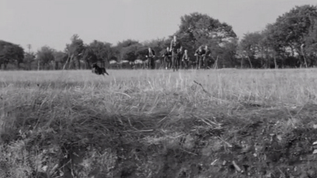 Reach for Glory - boys on bikes chasing black towards cliff