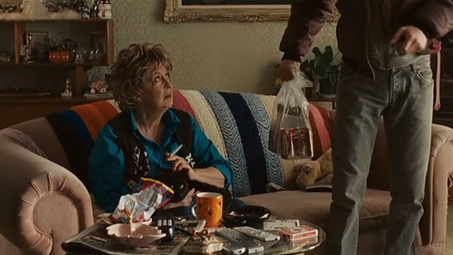 Real Time - grandma Jayne Eastwood sitting on couch with black cat on lap