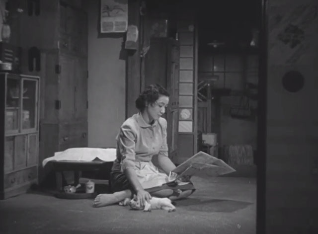 Repast - Michiyo Setsuko Hara reading newspaper while petting Japanese Bobtail kitten Yuri
