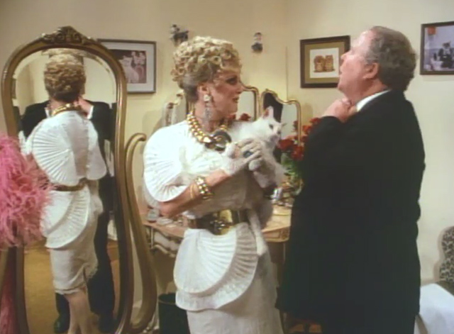 Repossessed - Ernest Weller Ned Beatty and Fanny Ray Weller Lana Schwab in dressing room with white cat Kit Kat
