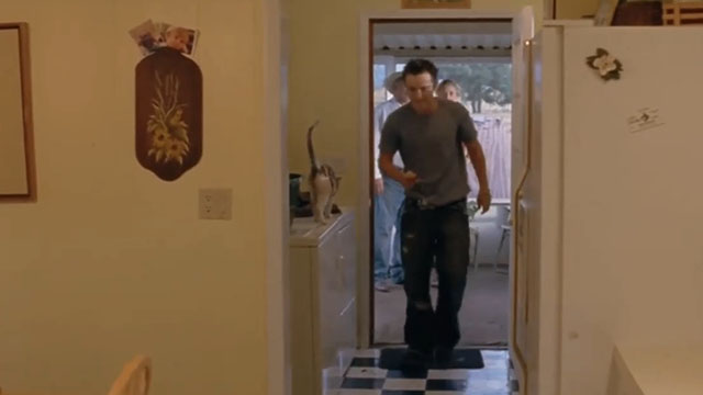 River's End - Clay Sam Huntington passing calico cat on washing machine