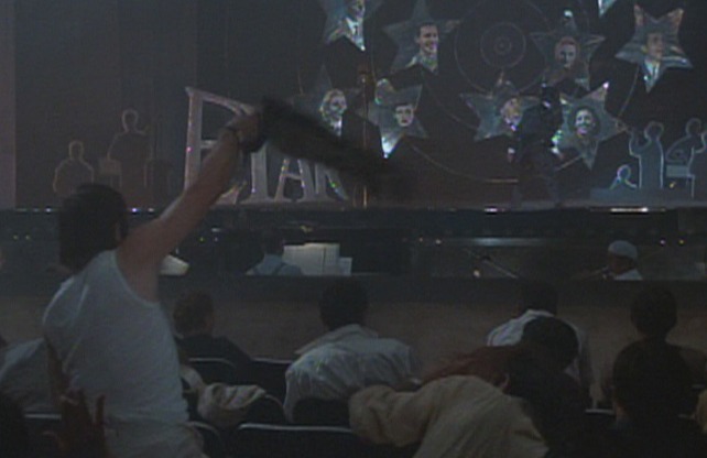 Roma - audience member swings dead cat over his head