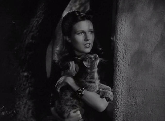 Romance of the Rio Grande - Maria Lynne Roberts holding tabby cat