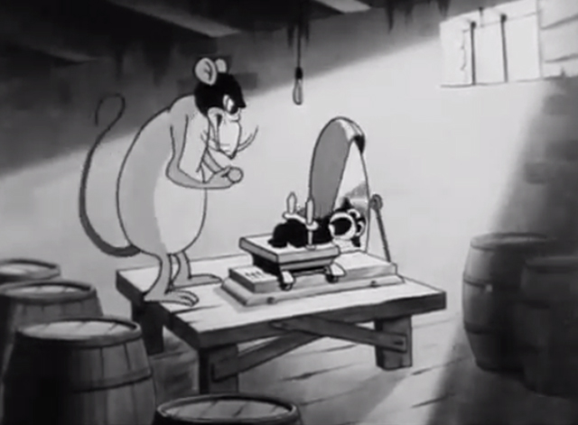 Rough on Rats - cartoon rat about to cut black kitten with meat slicer