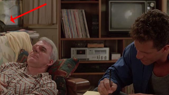 Roxanne - tabby cat barely seen behind C.D. Steve Martin with Chris Rick Rossovich