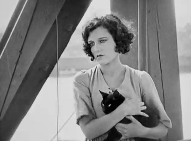 The Salvation Hunters - Georgia Hale holding black cat in boat in dock