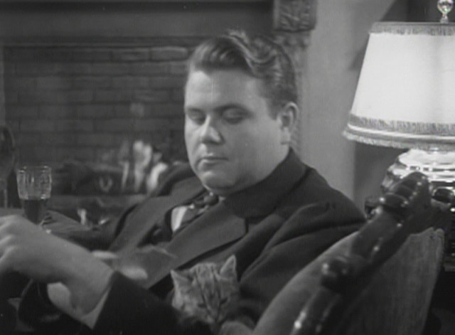 Satan Met a Lady - Kenneth Maynard Holmes with tabby kitten on lap