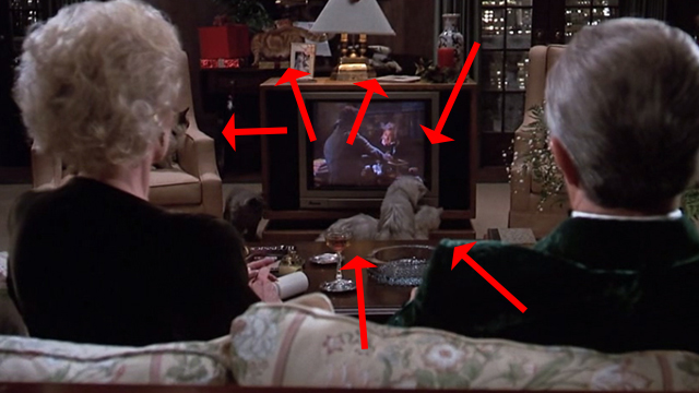 Scrooged - Preston Rhinelander Robert Mitchum and Maria Riva and multiple cats in living room