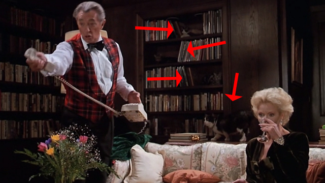 Scrooged - Preston Rhinelander Robert Mitchum and Maria Riva on couch with cats around them