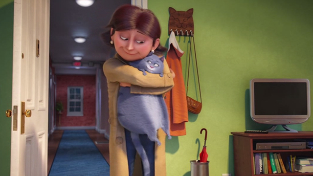 The Secret Life of Pets - gray tabby Chloe being hugged by owner