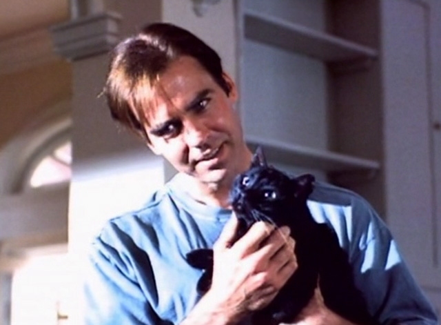 Serpent's Lair - Tom Jeff Fahey holding black cat
