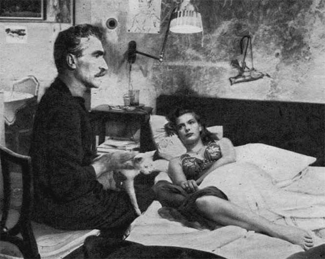 Les sept péchés capitaux - The Seven Deadly Sins - Olivier Orféo Tamburi holding white cat Saha on lap with Camille Andrée Debar