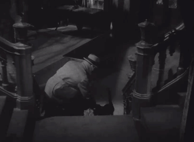 Seven Keys to Baldpate - black cat being nudged down stairs by William Magee Gene Raymond