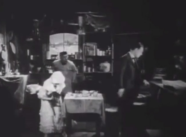 Shadows - Sympathy Marguerite De La Motte getting up from table with bengal tabby cat with Minister Maldon Harrison Ford and Yen Sing Lon Chaney