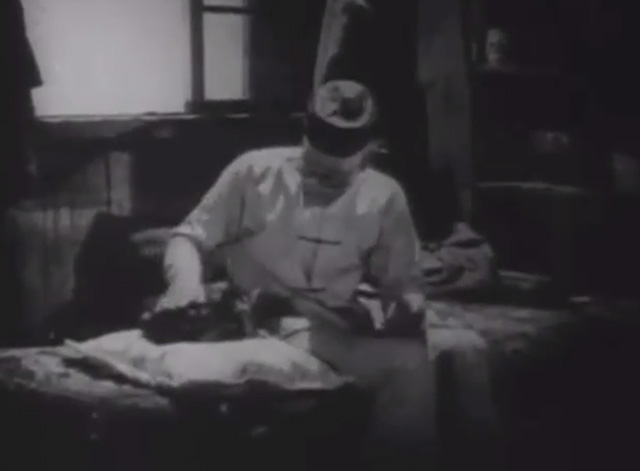 Shadows - Yen Sing Lon Chaney placing Bengal tabby cat on cushion