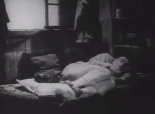 Shadows - Yen Sing Lon Chaney curling up on bed with Bengal tabby cat on cushion at feet