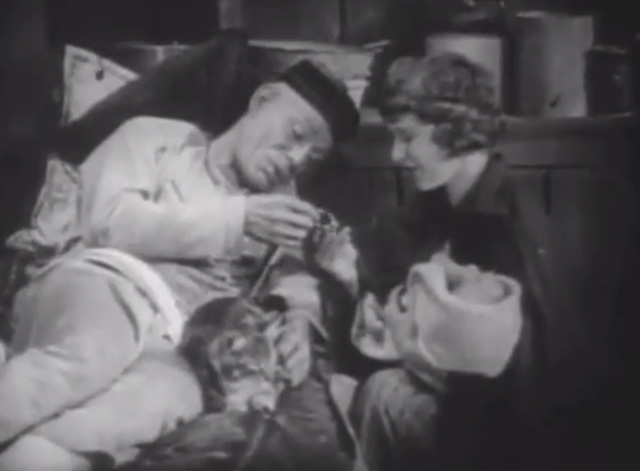 Shadows - Yen Sing Lon Chaney lying on death bed with Bengal tabby cat at his side giving Sympathy Marguerite De La Motte Minister a gift