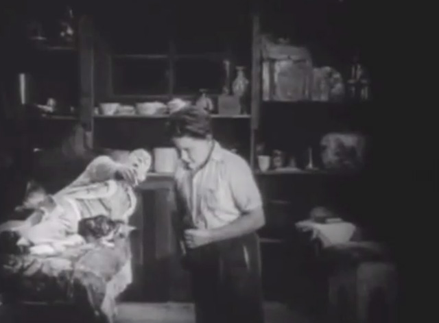 Shadows - Yen Sing Lon Chaney lying on death bed with Bengal tabby cat calling to boy Buddy Messenger