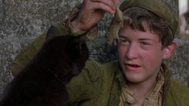 Shakespeare in Love - John Webster holds up mouse in front of black cat close