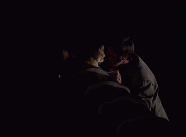 Shamus - McCoy Burt Reynolds head butting with Cat Morris on wall