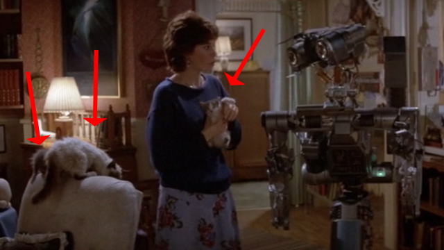 Short Circuit - Stephanie Ally Sheedy holding kitten with cats in background and Number 5