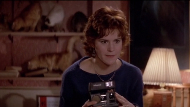 Short Circuit - Stephanie Ally Sheedy with cats on bookshelves behind