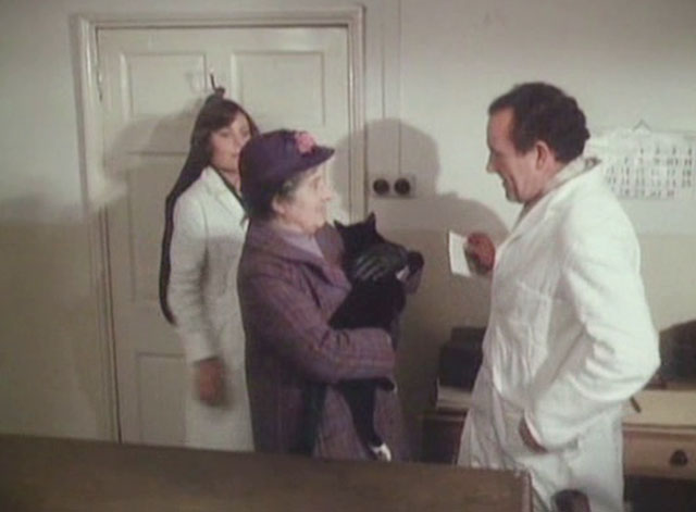 It Shouldn't Happen to a Vet - Mrs. Bond Marjorie Sudell holding tuxedo cat Seven Times Three greeting Farnon Colin Blakely