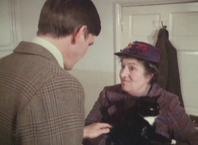 It Shouldn't Happen to a Vet - Mrs. Bond Marjorie Sudell holding tuxedo cat Seven Times Three with Carmody Paul Shelley