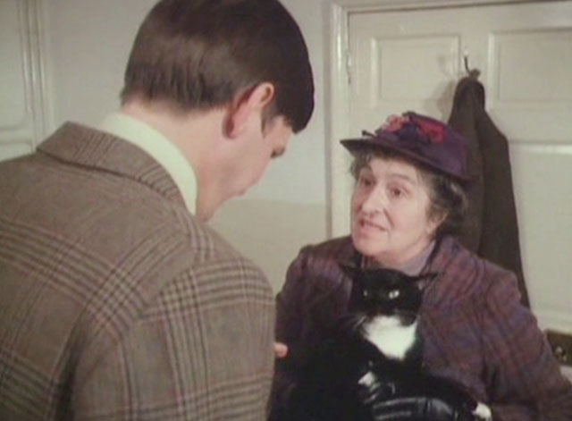 It Shouldn't Happen to a Vet - Mrs. Bond Marjorie Sudell holding tuxedo cat Seven Times Three with Carmody Paul Shelley