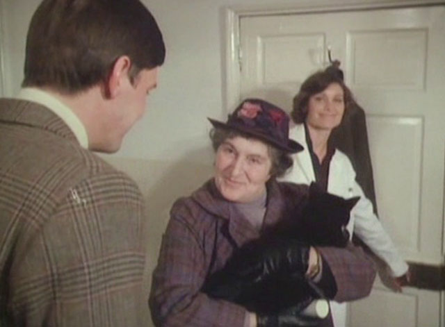 It Shouldn't Happen to a Vet - Mrs. Bond Marjorie Sudell holding tuxedo cat Seven Times Three with Carmody Paul Shelley