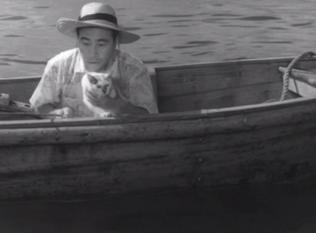 Shozo, a Cat and Two Women - Shozo Hisaya Morishige fishing on boat with white and calico cat Lily
