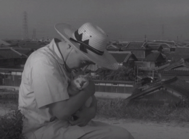 Shozo, a Cat and Two Women - Shozo Hisaya Morishige hugging white and calico cat Lily