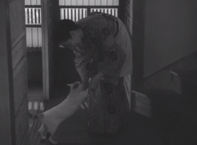 Shozo, a Cat and Two Women - Shinako Isuzu Yamada dancing with white and calico cat Lily