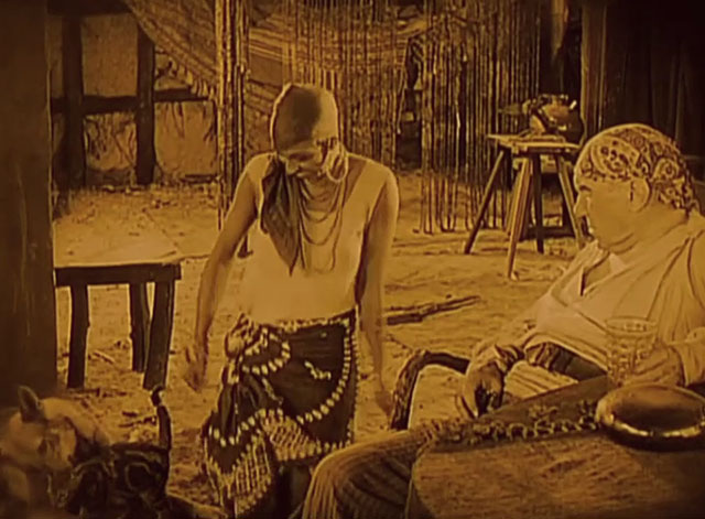 Siren of the Tropics - Papitou Josephine Baker looking at little tabby cat with dog Bamboula and her father Adolphe Candé