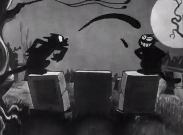 The Skeleton Dance - black cat spits on other black cat on tombstones at night